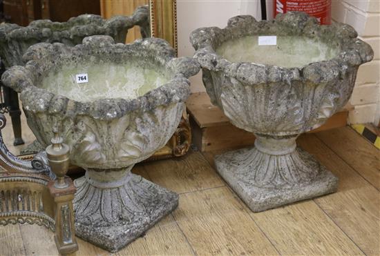 A pair of garden urns W.46cm